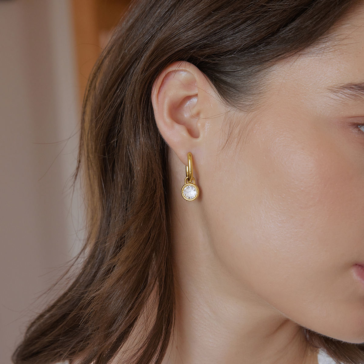 Gold Halo Drop Huggies with clear stone