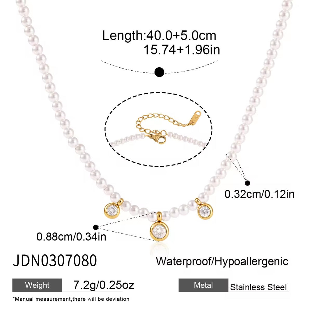 Pearl necklace with gold crystal pendants
