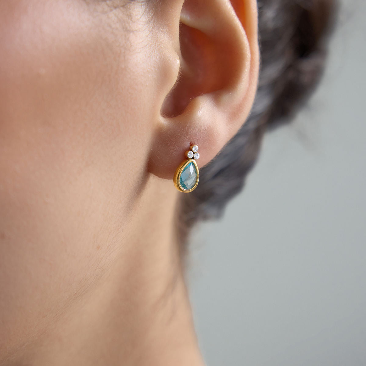 Aqua Teardrop Earrings worn on ear