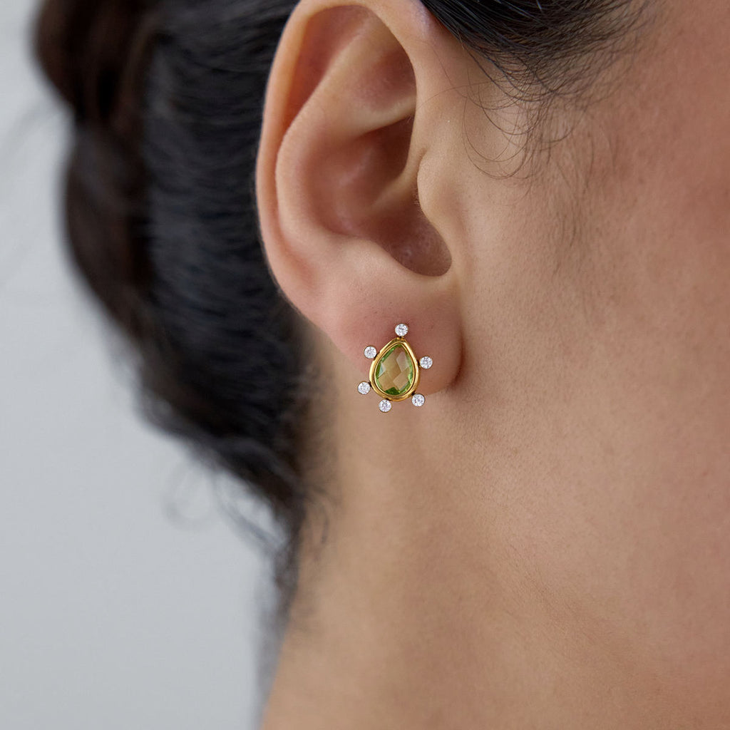 Peridot Teardrop Earrings worn on ear