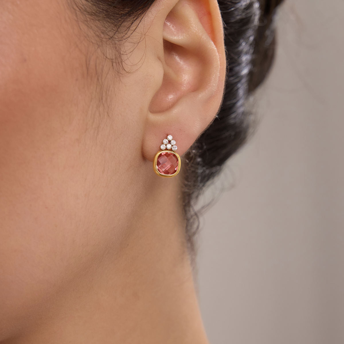 Rosé Crystal Teardrop Earrings worn on ear
